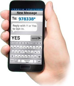 Picture of hand holding mobile device asking people to text "Y" to 978338.